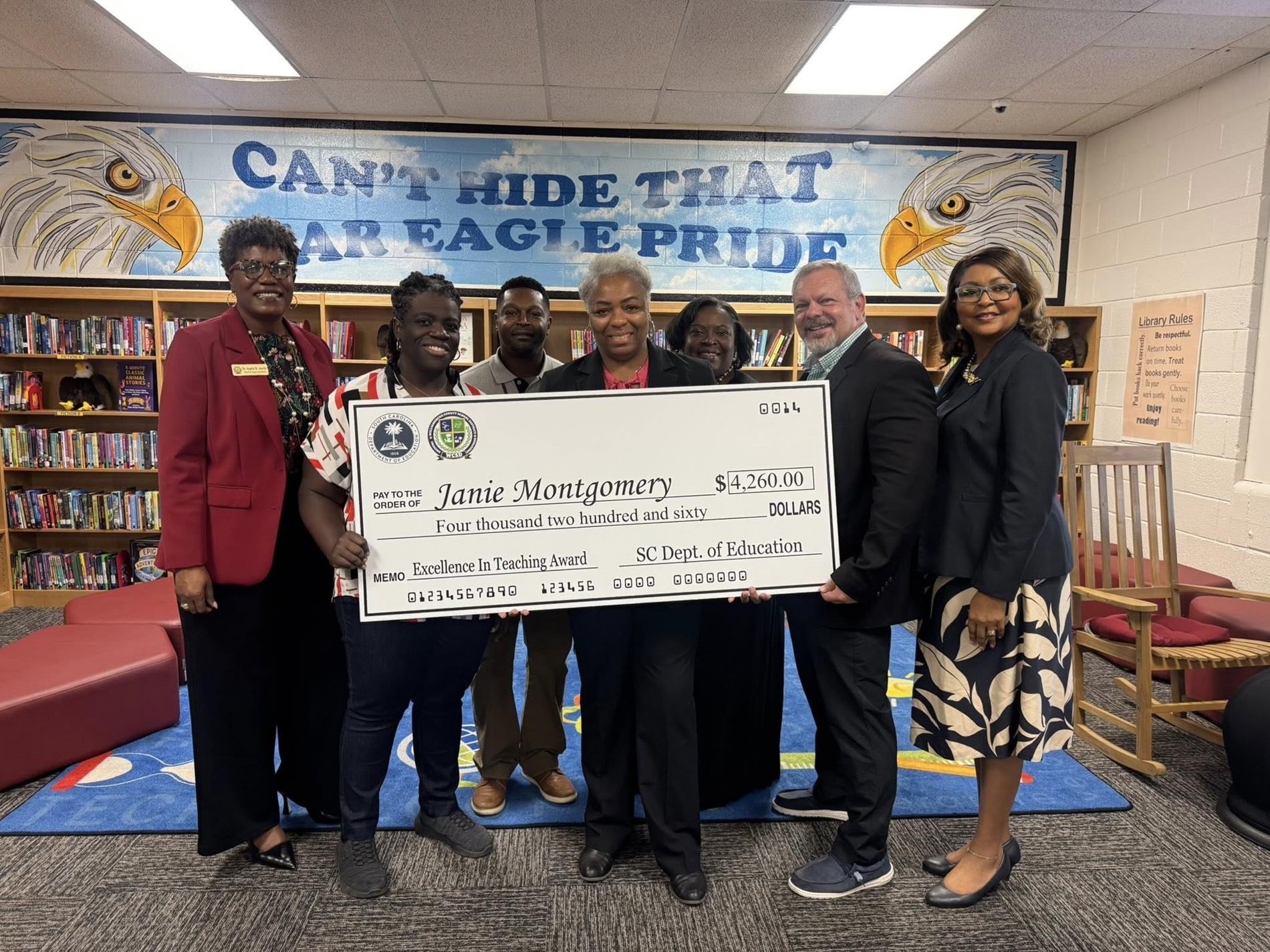 people standing in library 