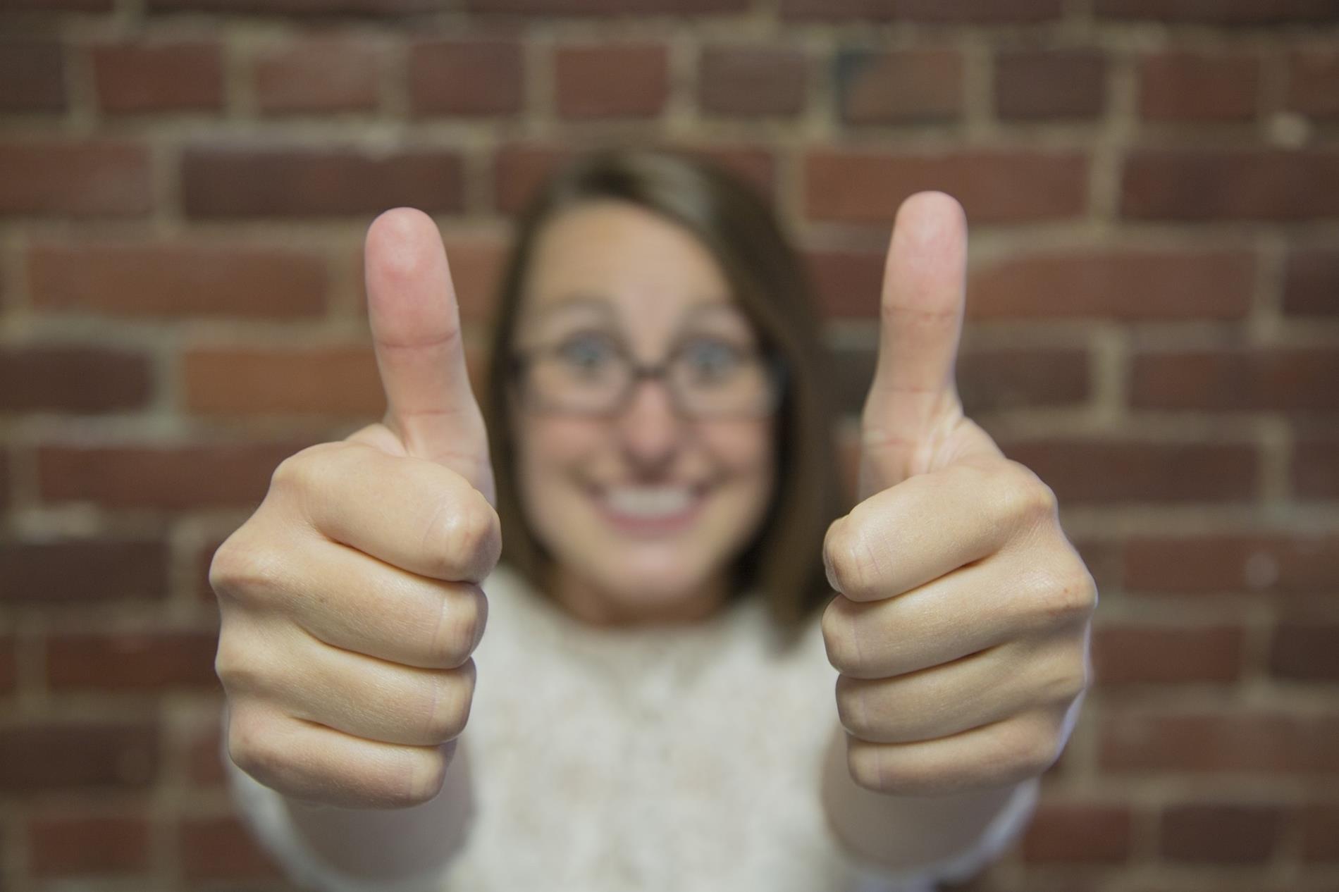 picture of person giving thumbs up
