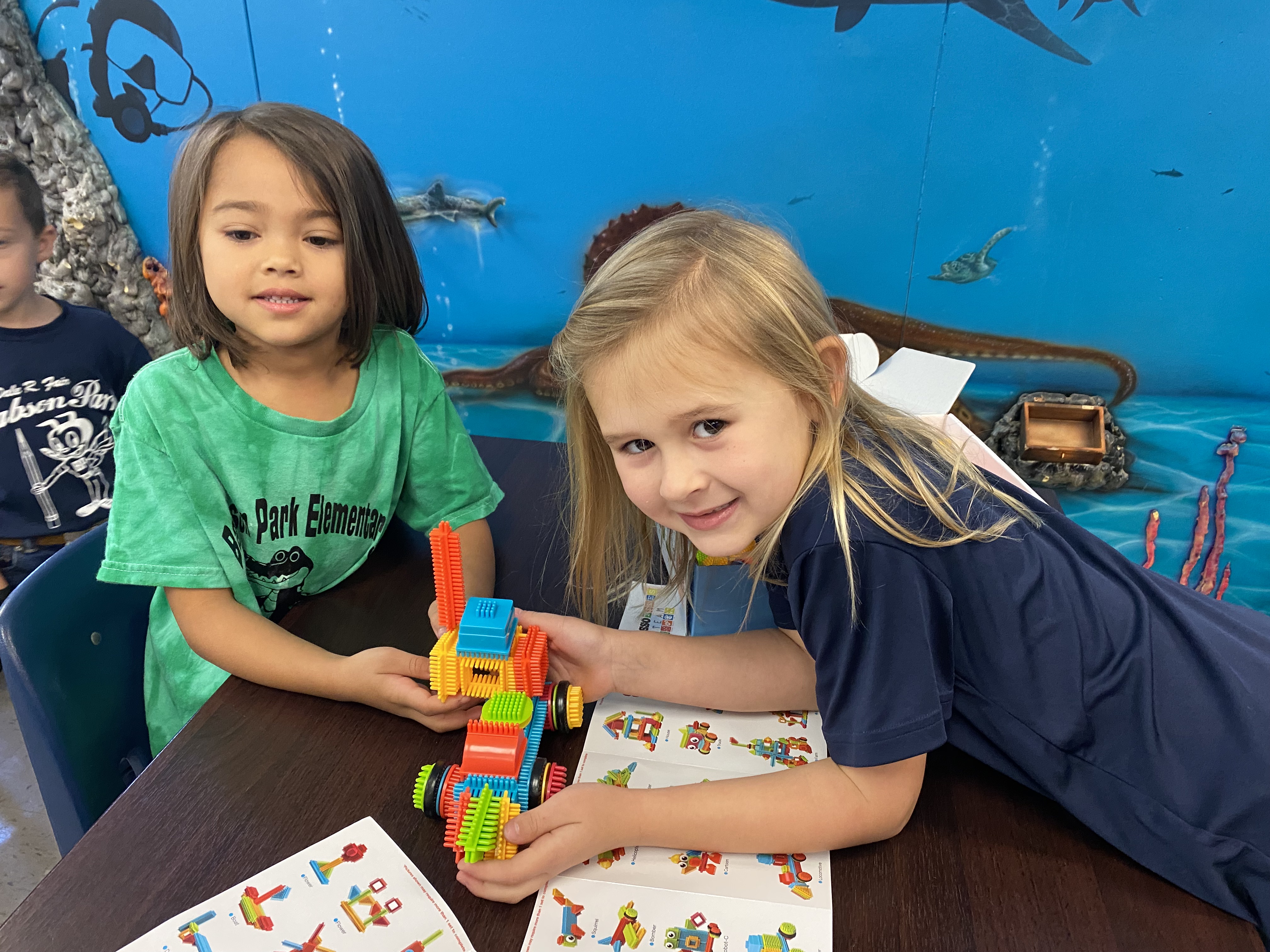 Kindergarten students exploring how to be an engineer with Bristle toys.