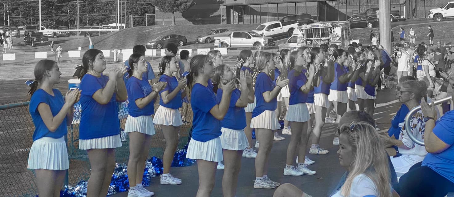 EHMS Cheerleaders cheering for the football team