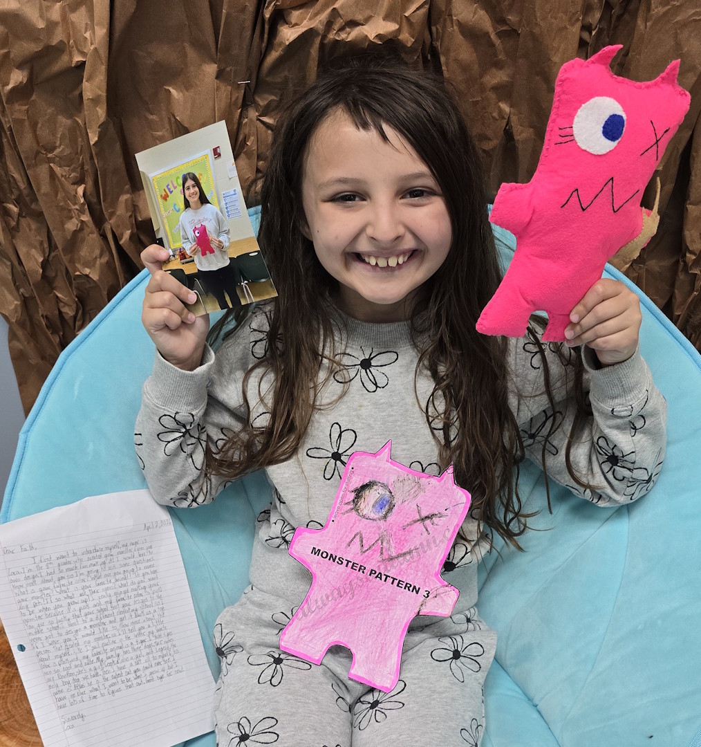 2nd grade student and her monster.