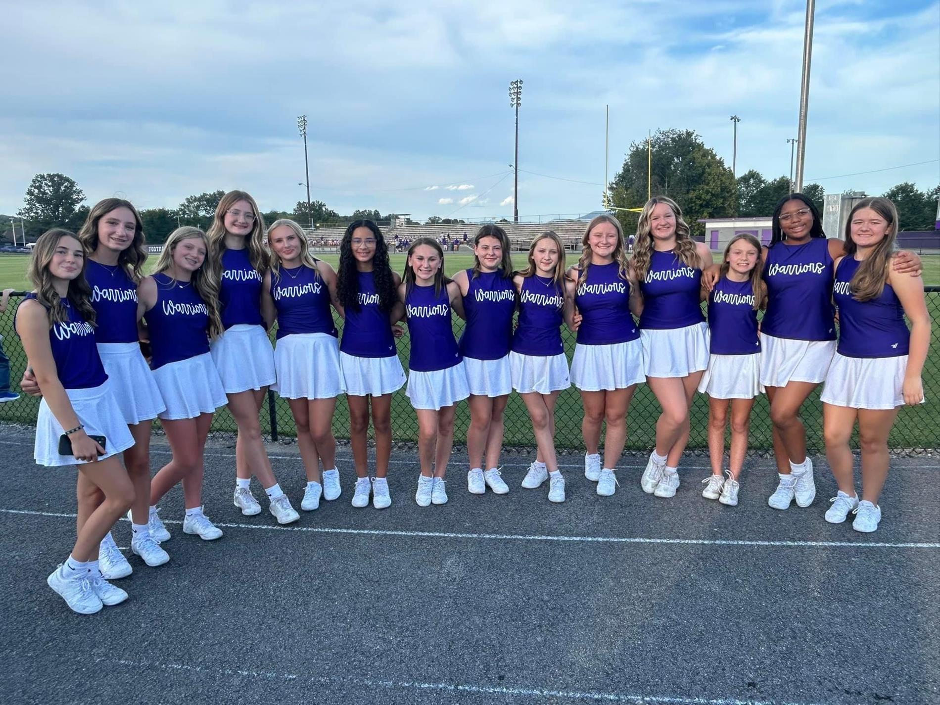 cheerleaders at football field