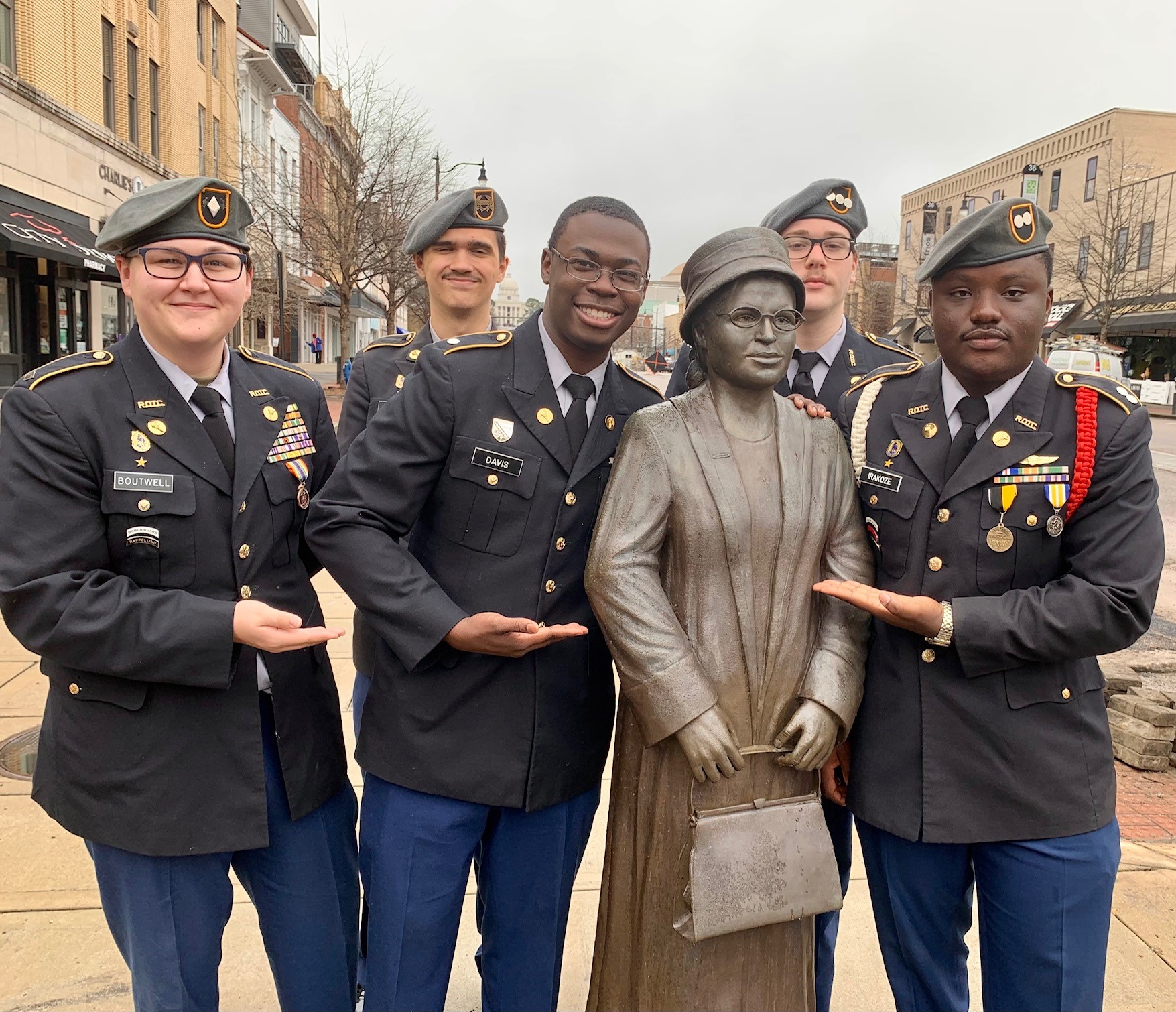 Murphy and Blount JROTC male cadets pose with the Rosa Parks Memorial Bust on Dexter Avenue in Montgomery, Alabama