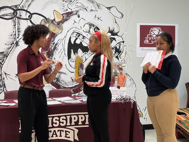 Students talking with Mississippi State University