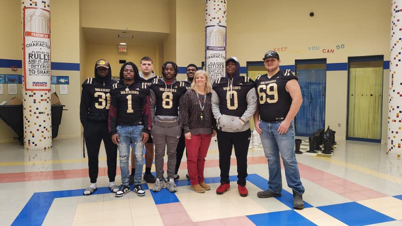Oct 2023 ECCC Football players and coach visit