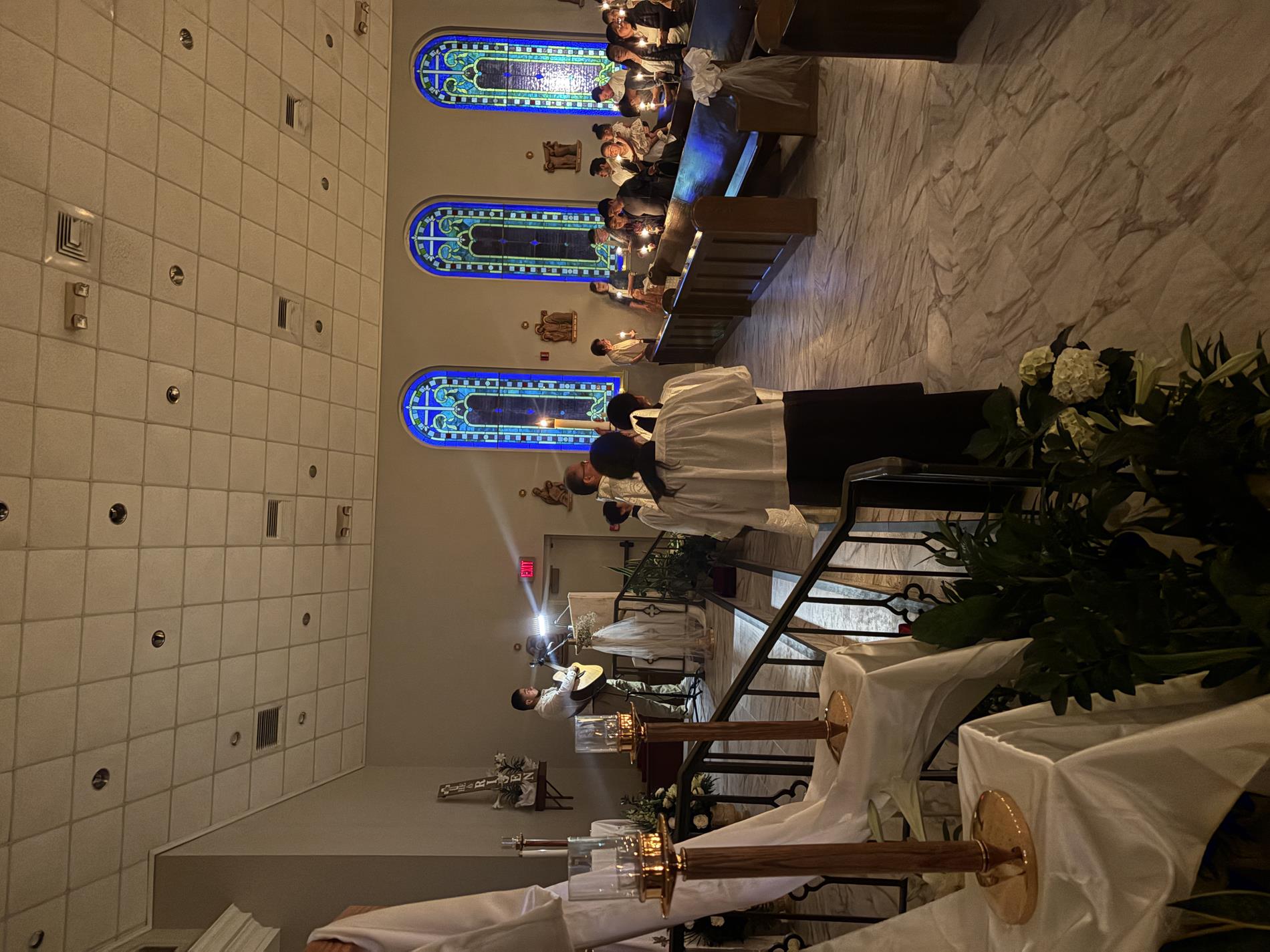 Paschal candle arrives at front of church