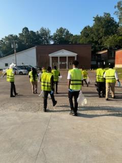 Law & Public Safety & Educator Prep Doing Community Service Cleaning the Campus of HSHS/Juniors and Seniors Community Service