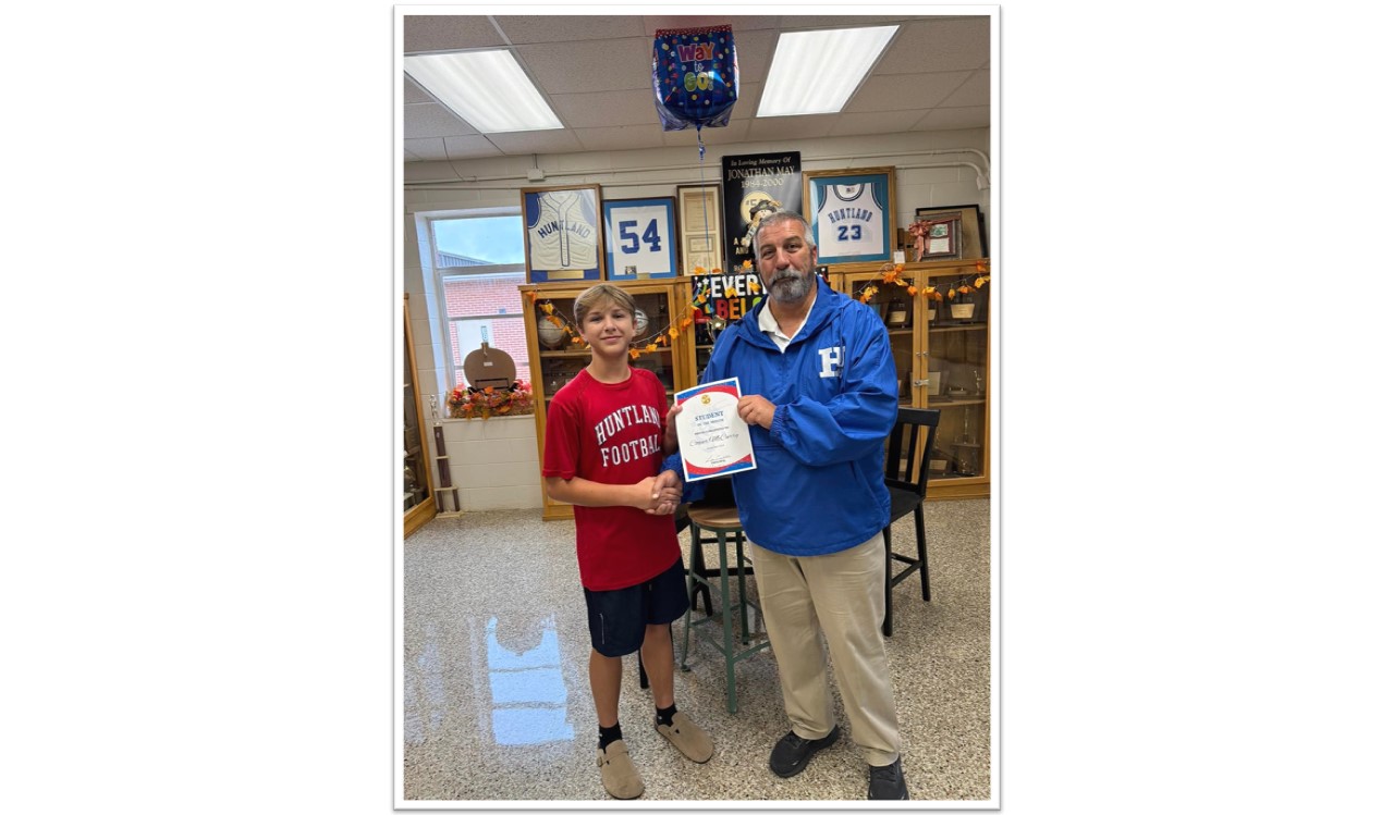 Cooper McCurry, our middle school Student of the Month for November, is pictured with his assistant principal.