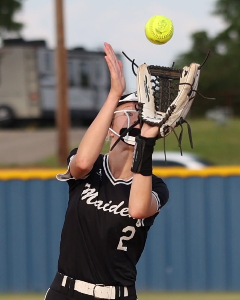 Softball player makes a catch