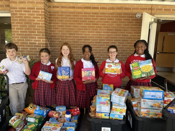 Each grade level contributed specific food items for the Servant's Love Food Drive.