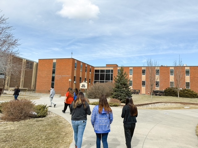 Students walking into school building