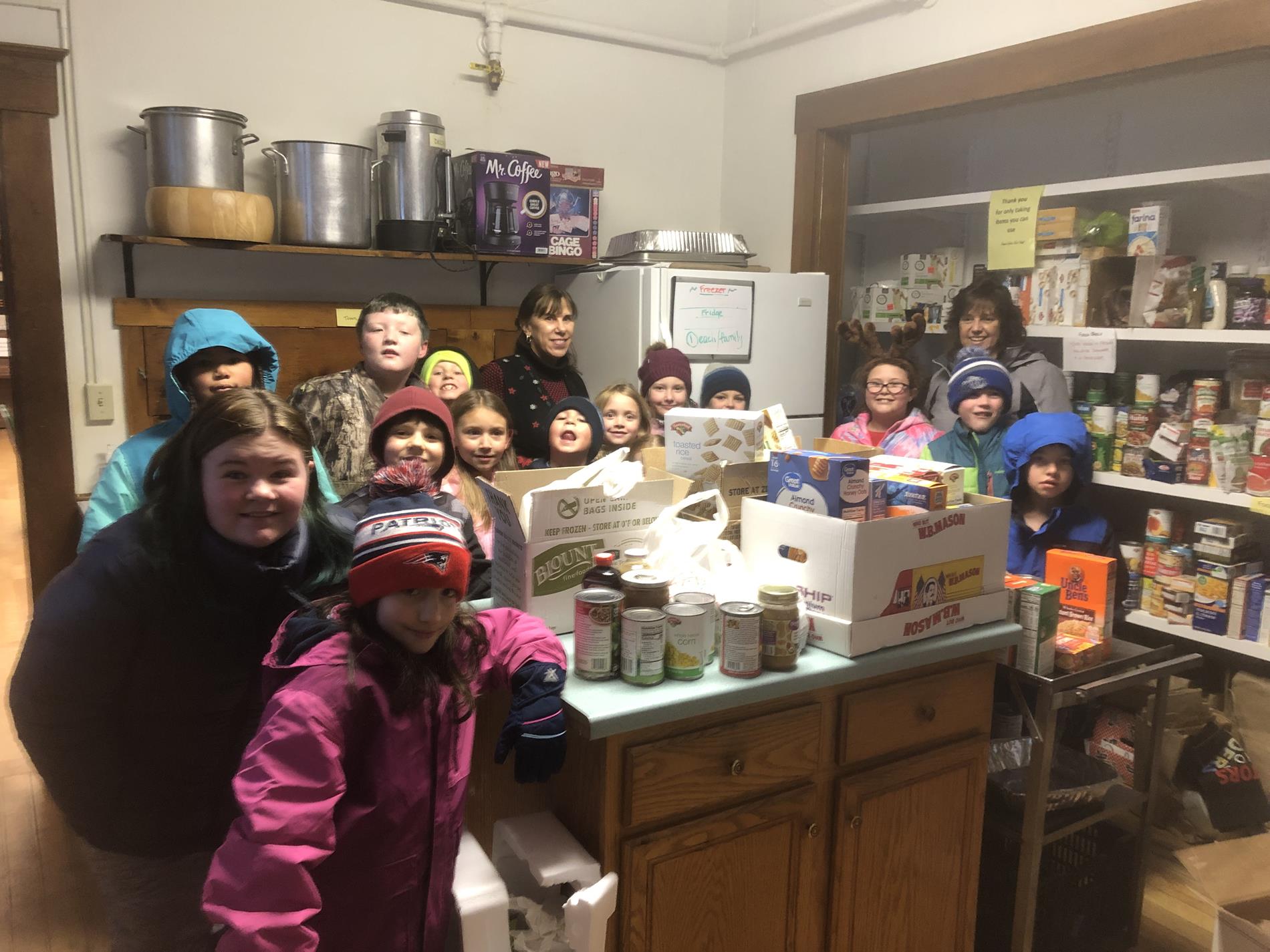 After The Bell After School Program drop off their donations at the Food Shelf