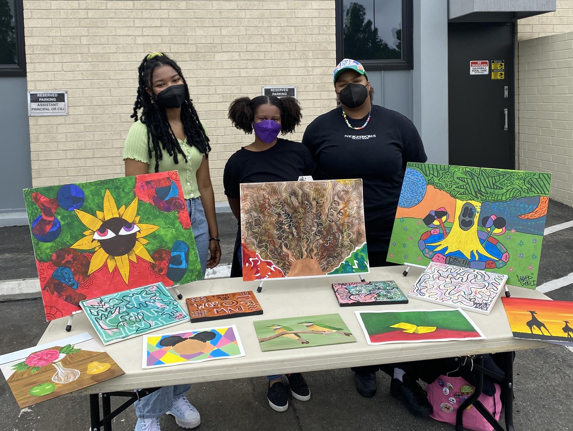 Students with Art on display
