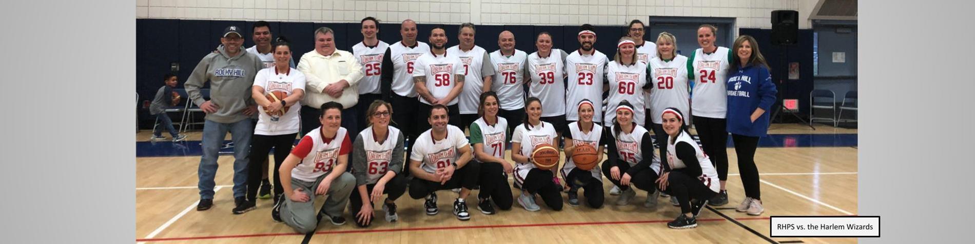 RHPS staff team group photo for the Harlem Wizards game