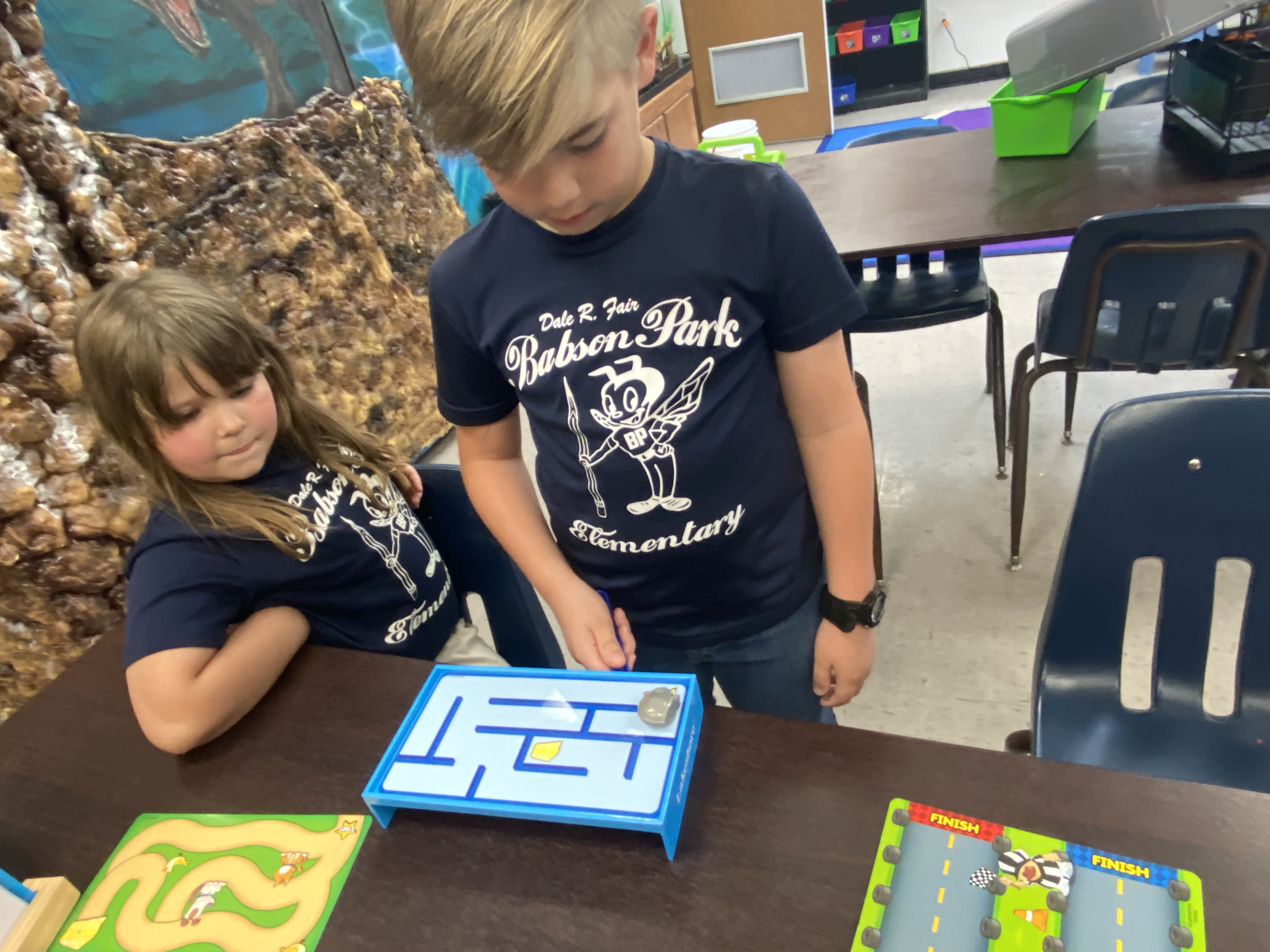 1st Grade students exploring magnets.