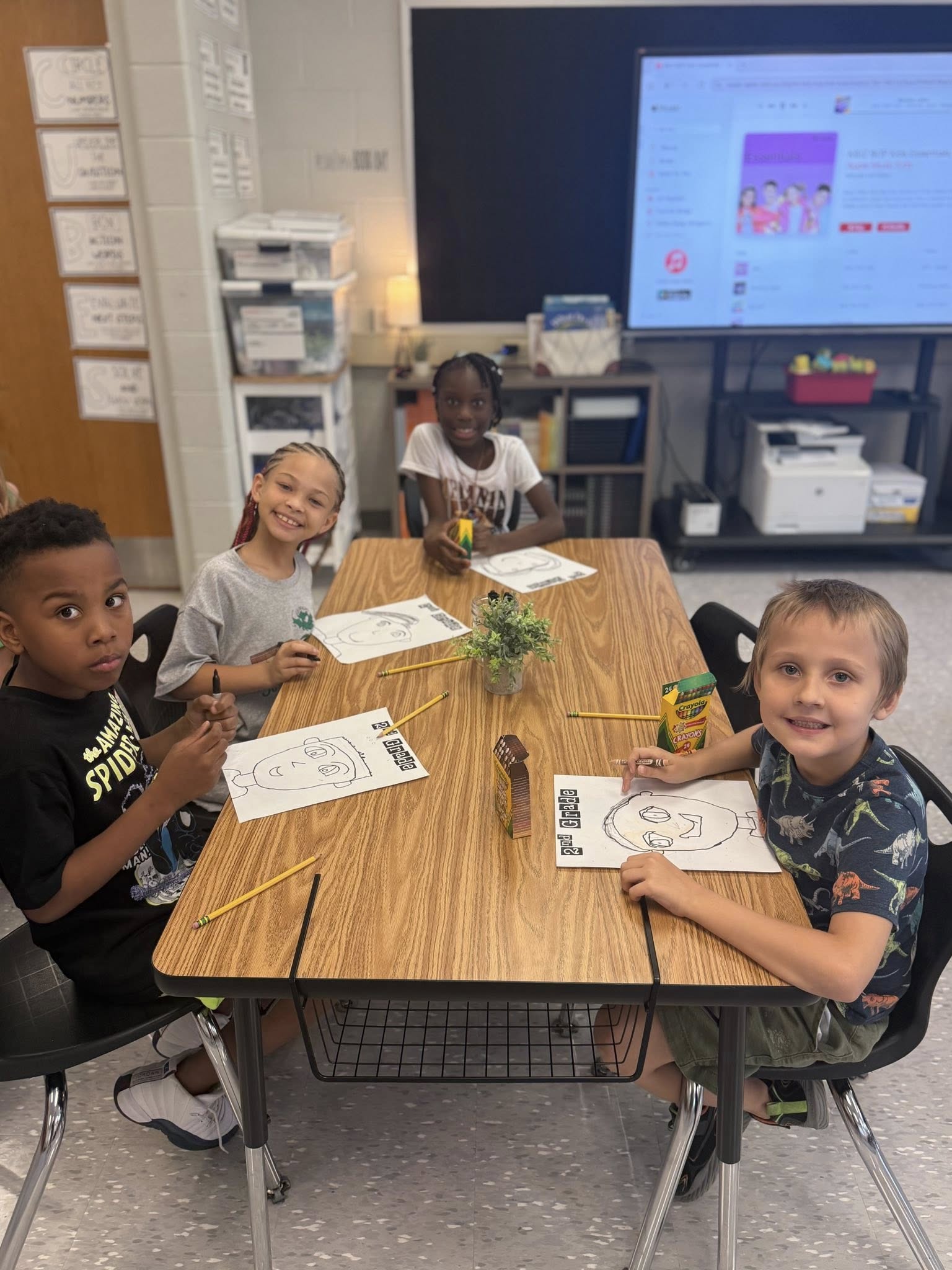 2nd Graders drawing portraits 