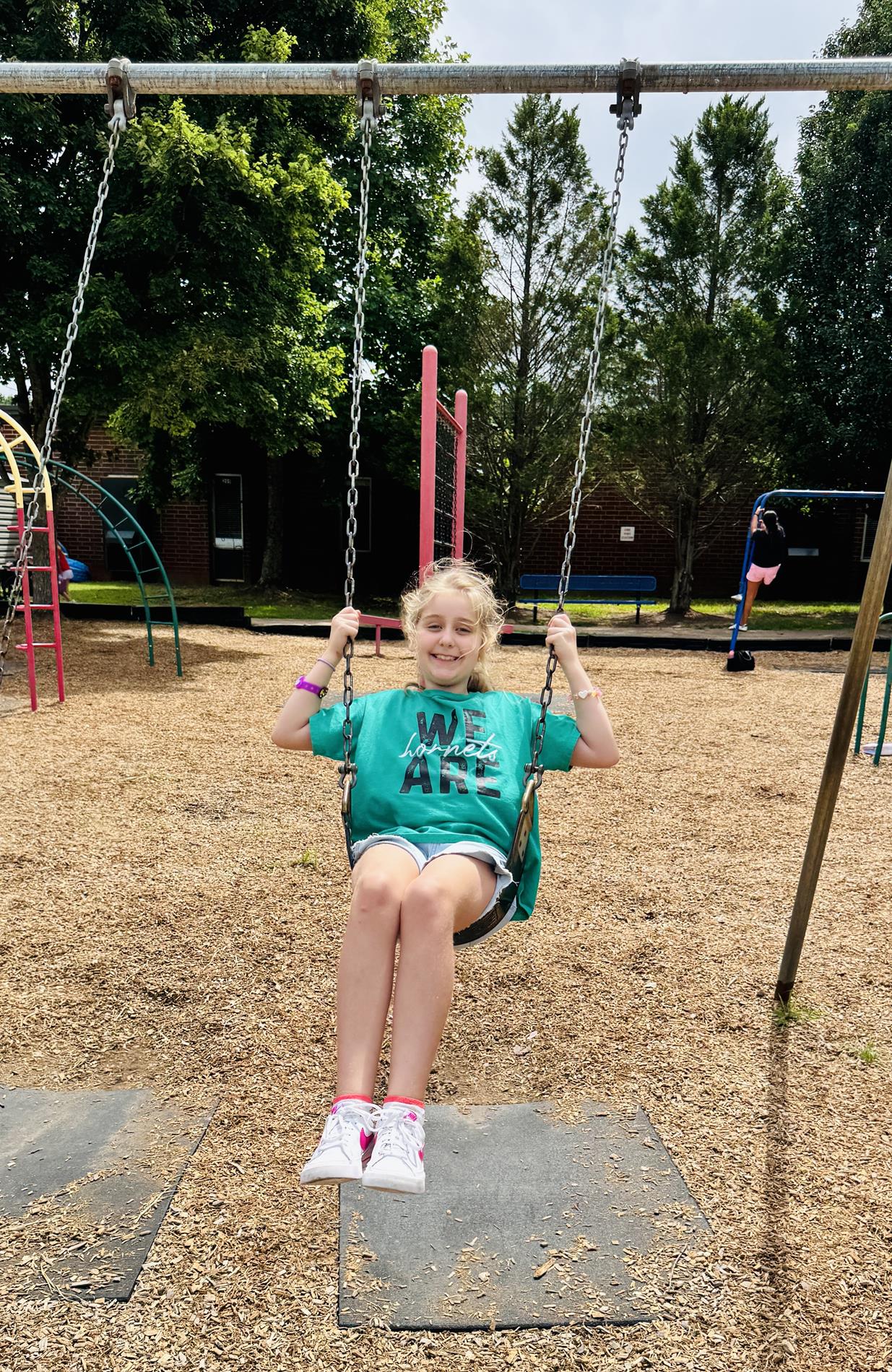 Student on swings