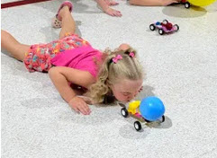 child playing with toy