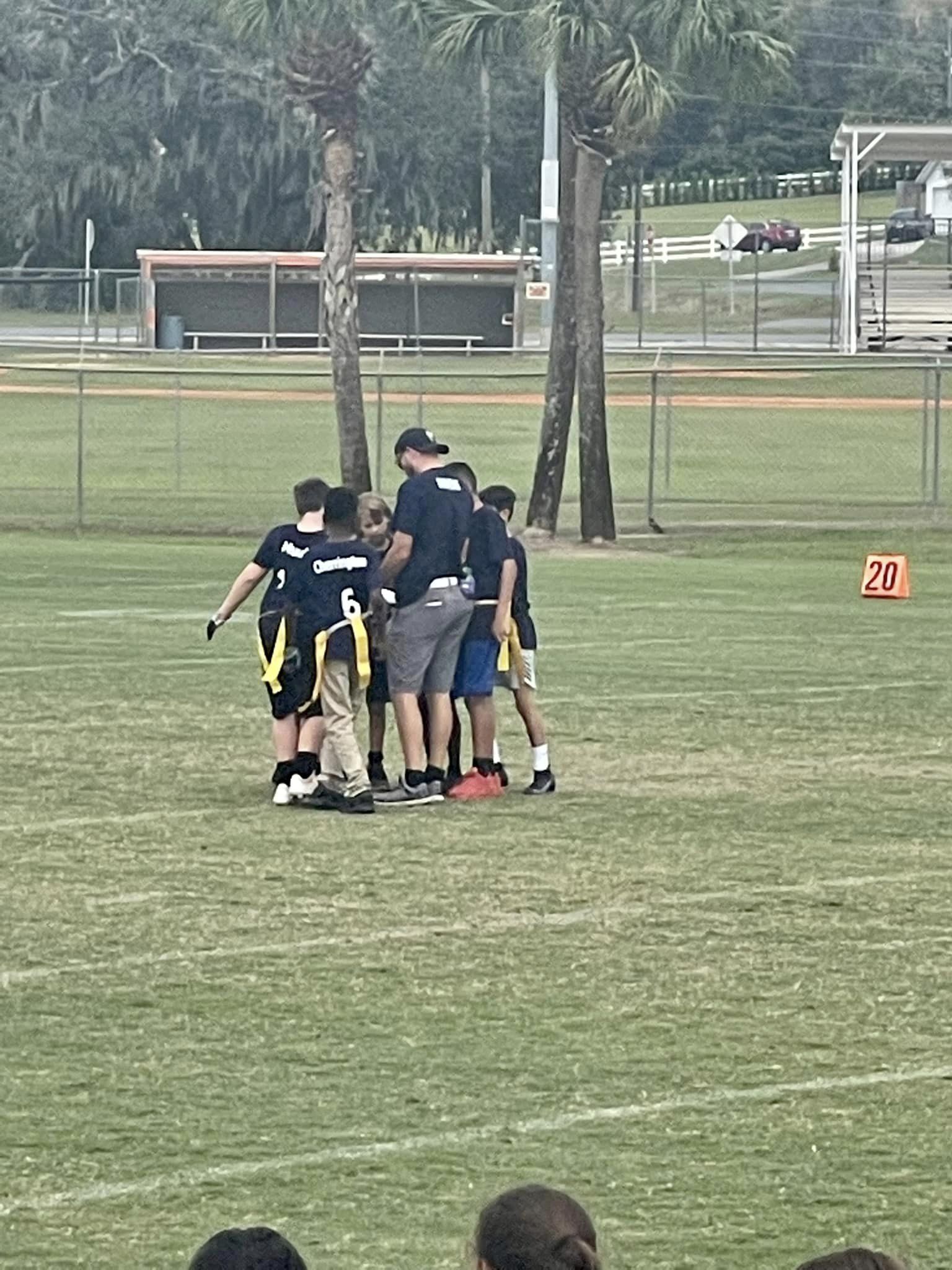 Players huddled with Coach Havens.