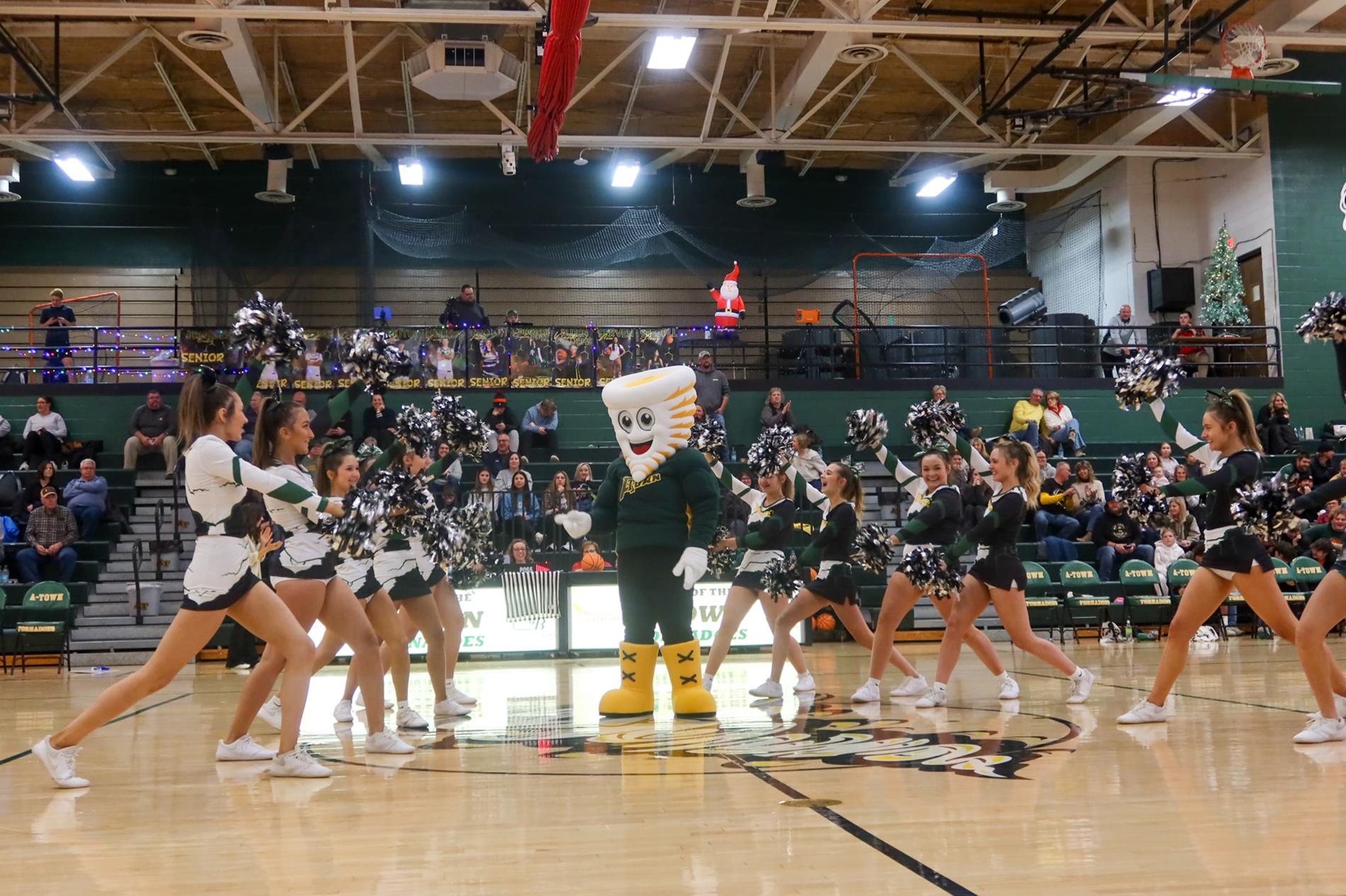 Atown Cheerleaders Celebrate with Tommy Tornado