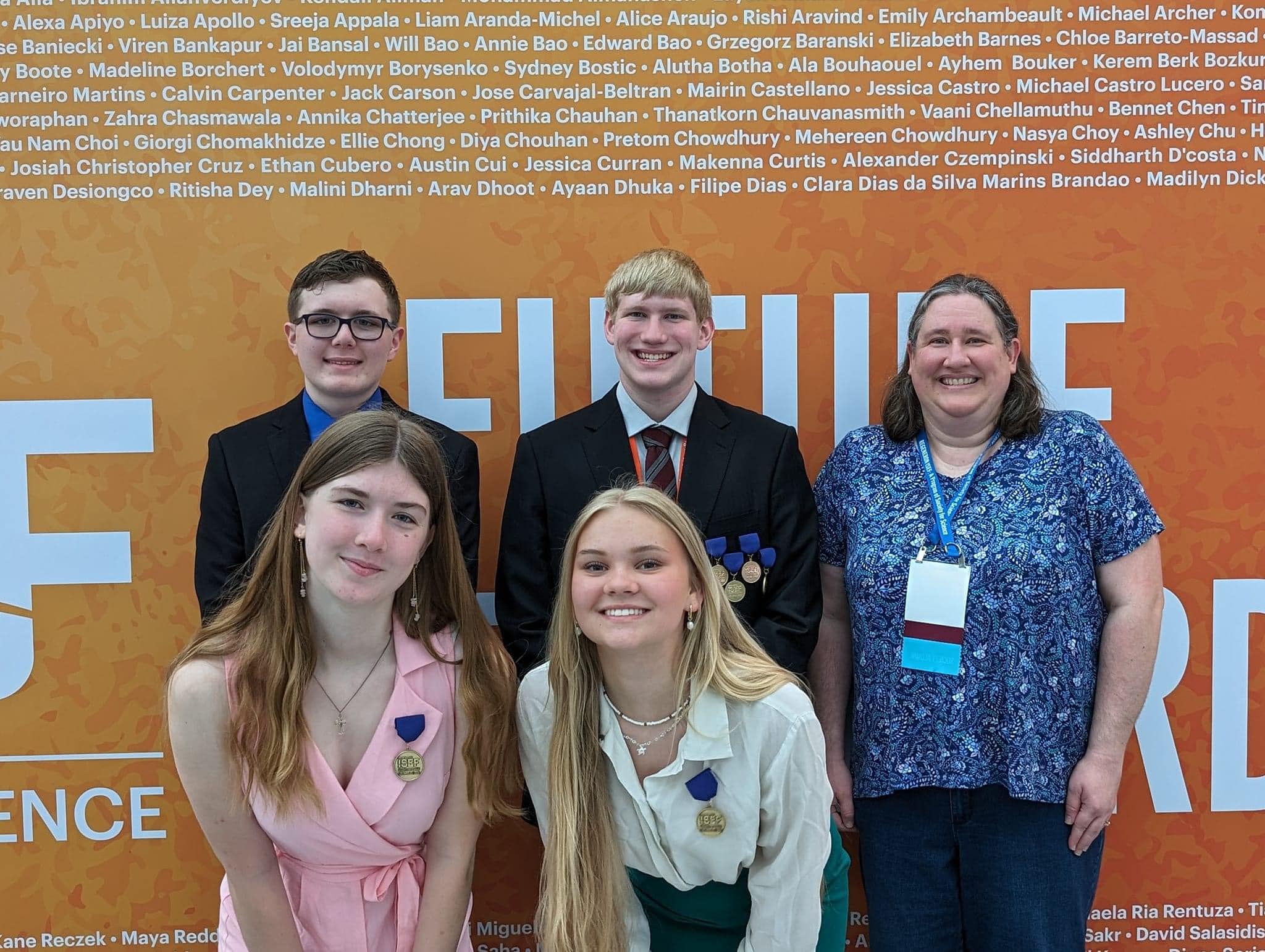  ISEF presenters and alternates Gavin, Elise, and Amla with Coach Patty