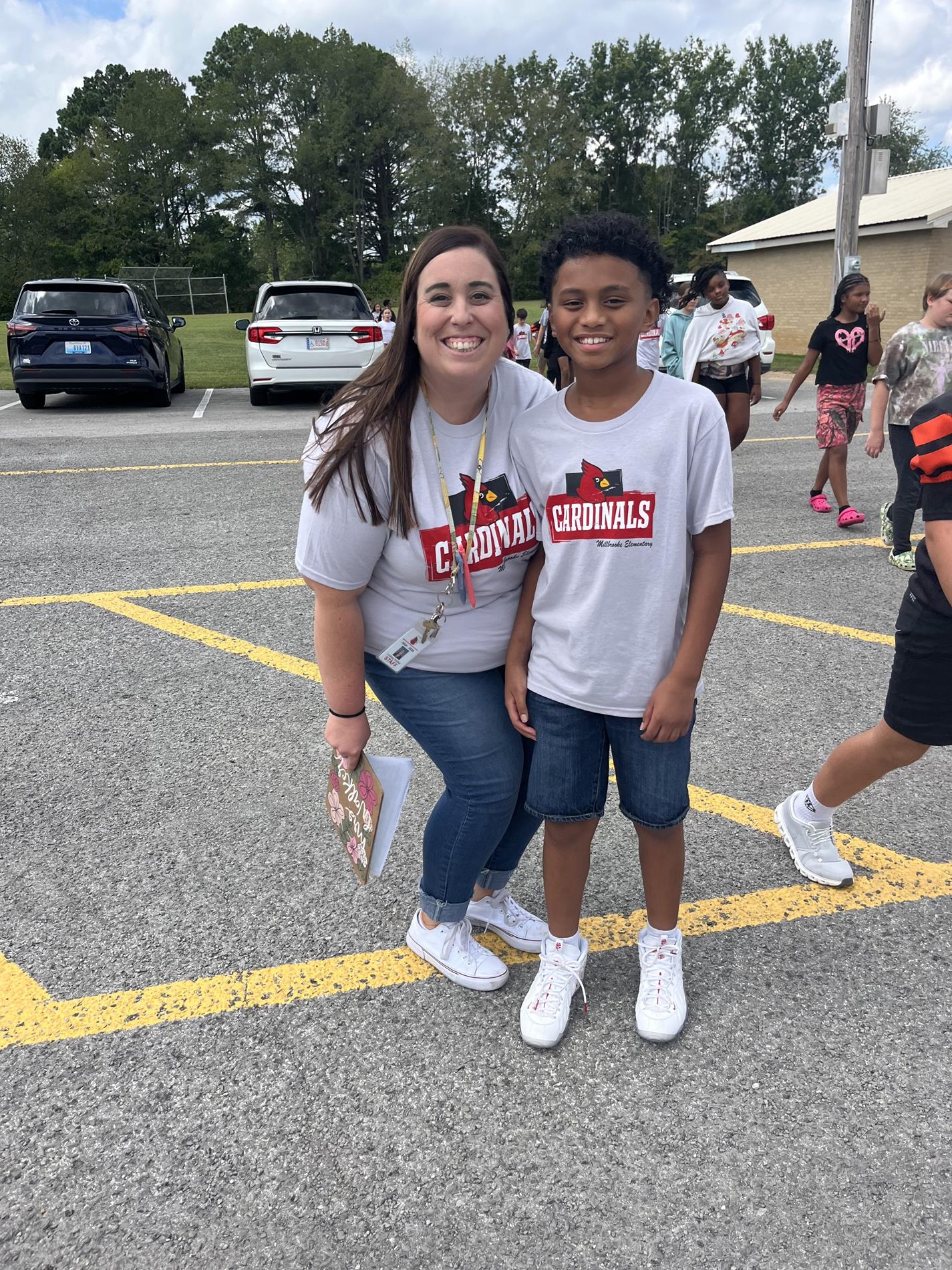 5th grade teacher and student