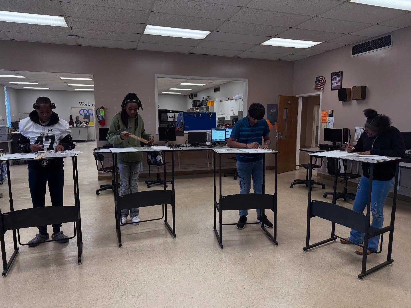 West Point Career and Technology Center Engineering students working at drafting tables