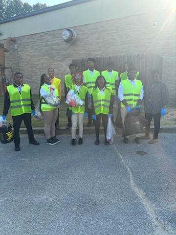 Law & Public Safety & Educator Prep Doing Community Service Cleaning the Campus of HSHS/Juniors and Seniors Community Service