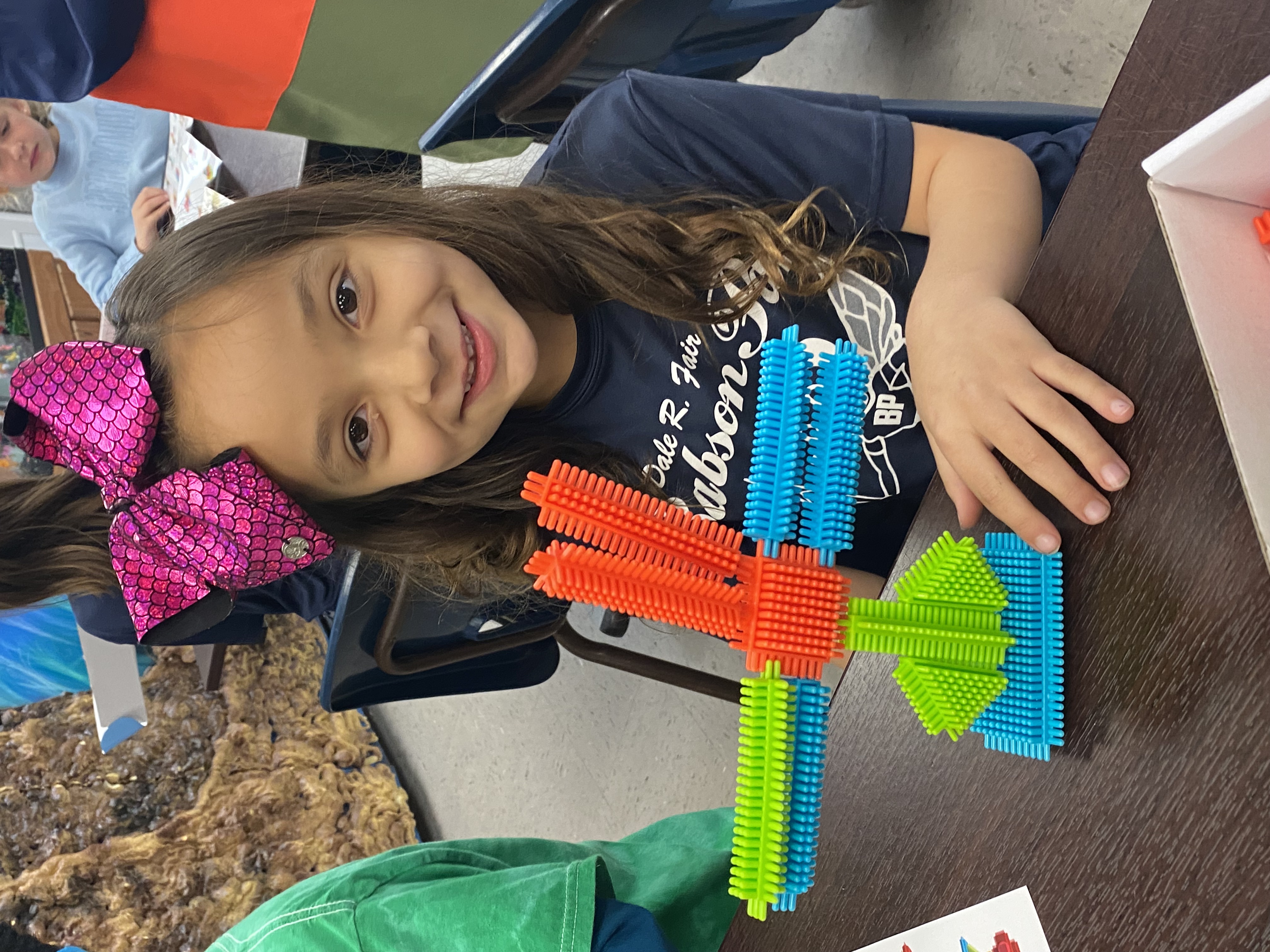 Kindergarten students exploring how to be an engineer with Bristle toys.