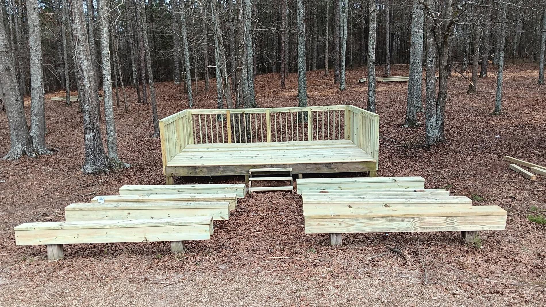 Outdoor Classroom with restored wood on seating area and platform