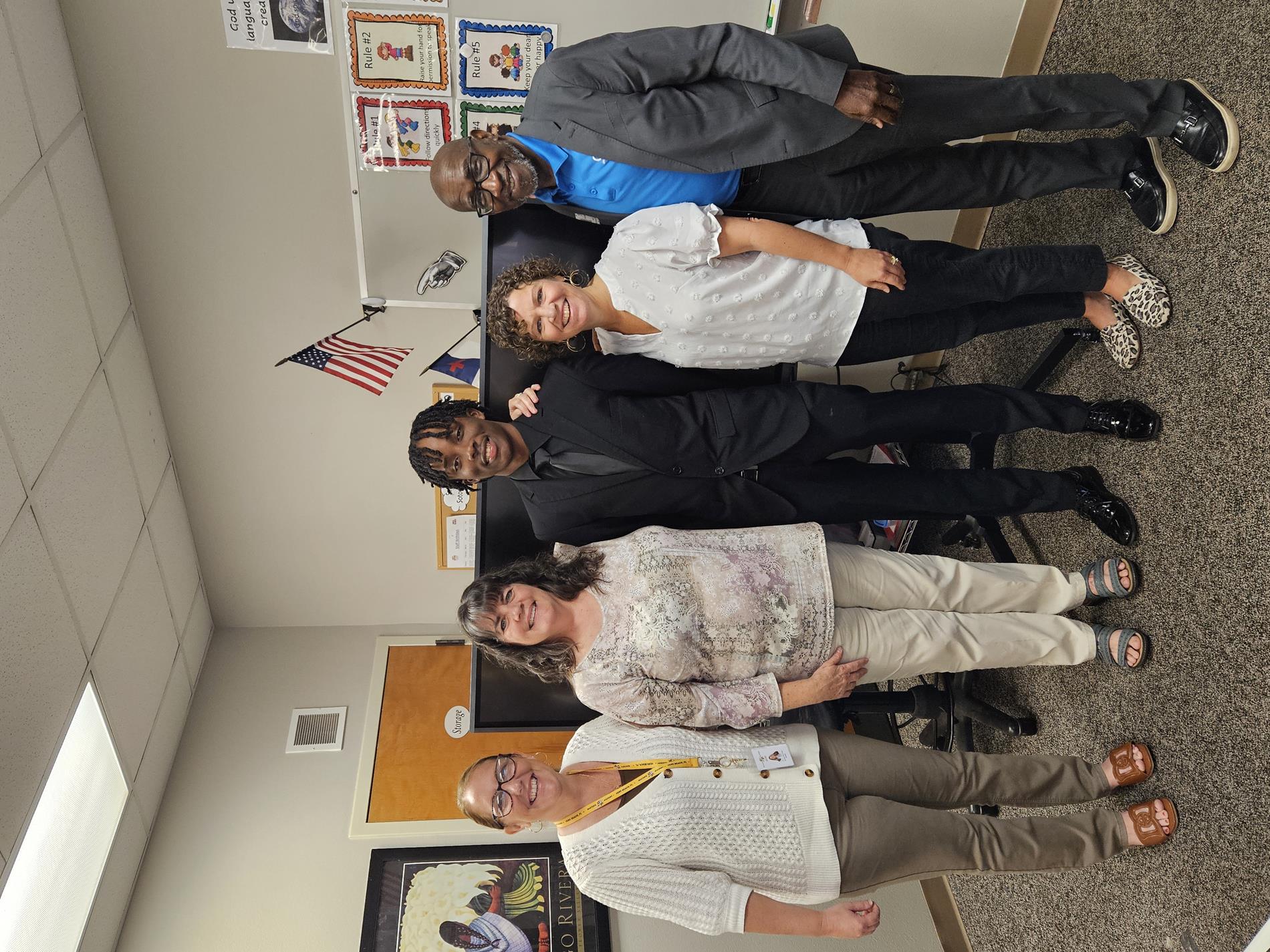 staff and student posing