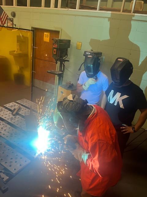 Welders working in the welding shop