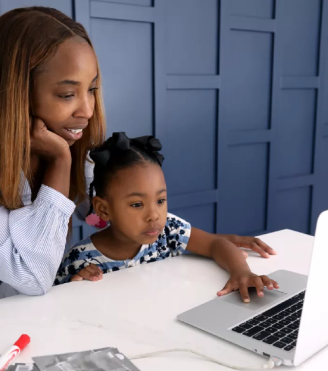 mother and child at computer