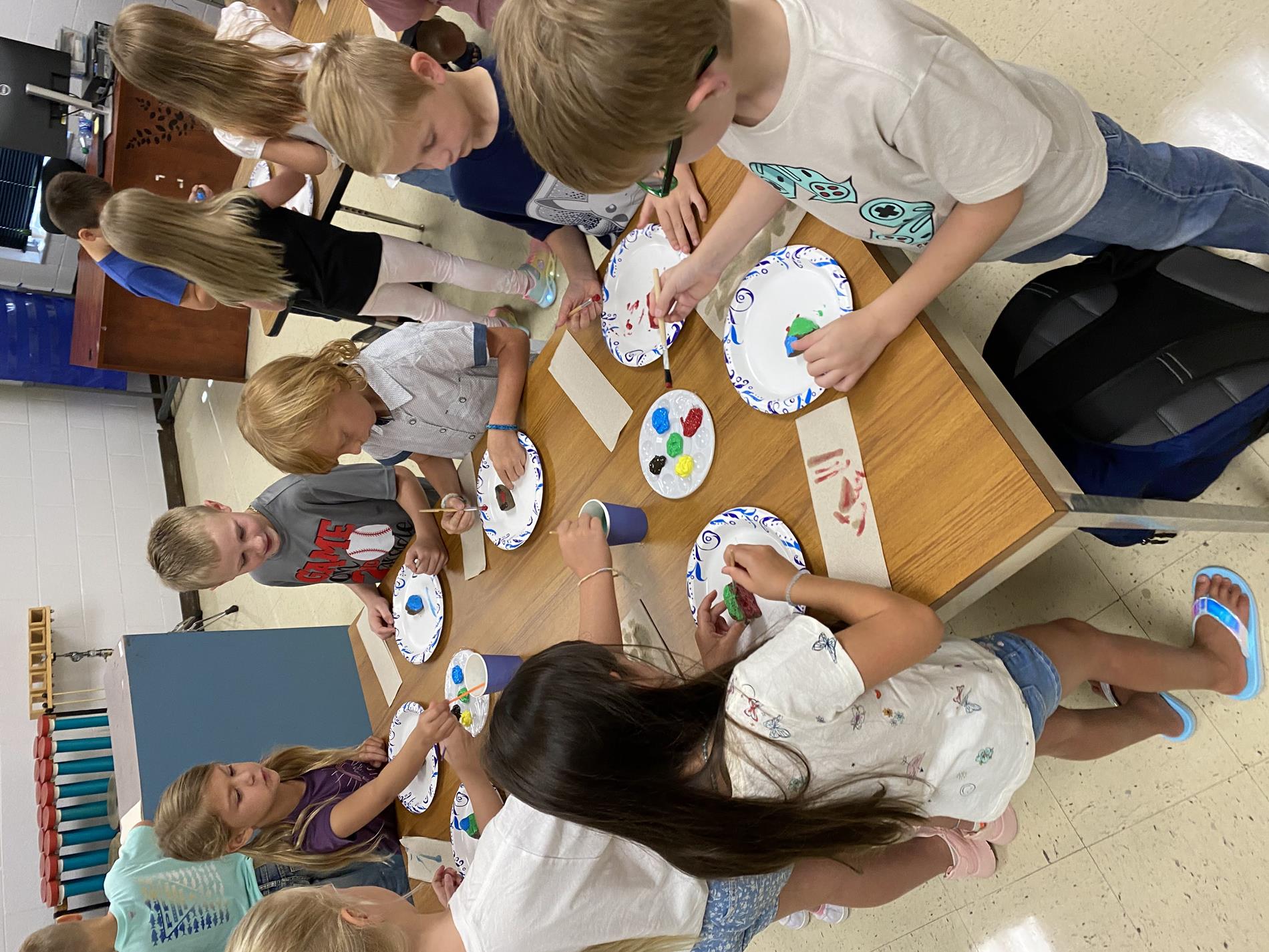 Painting with the Principal during orientation day.