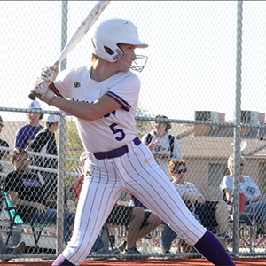 LHHS Softball player swings at pitch
