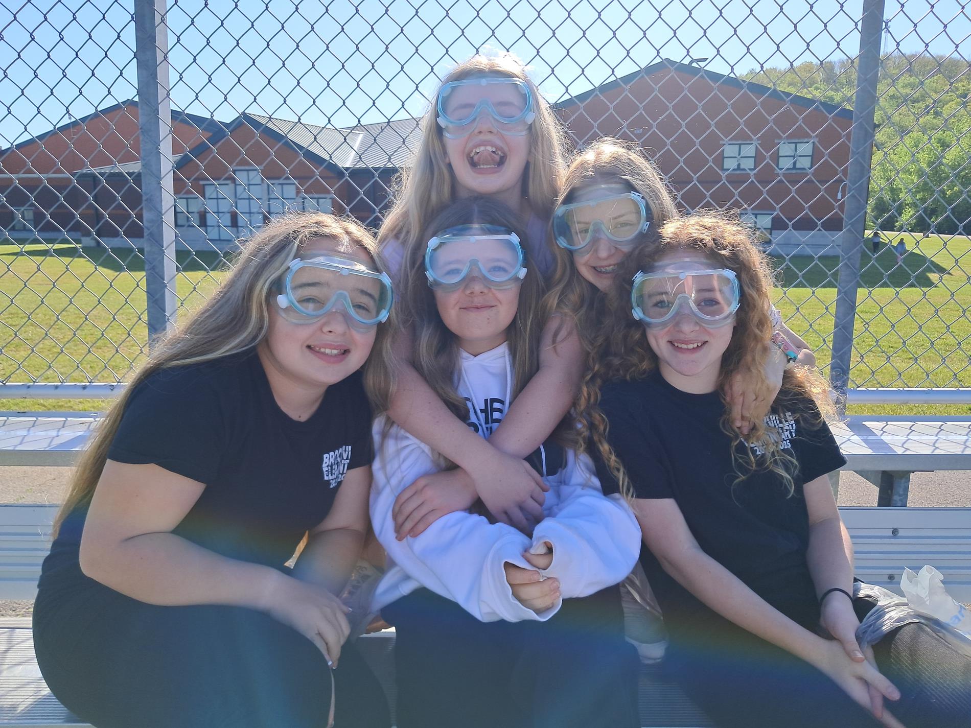 students with safety goggles