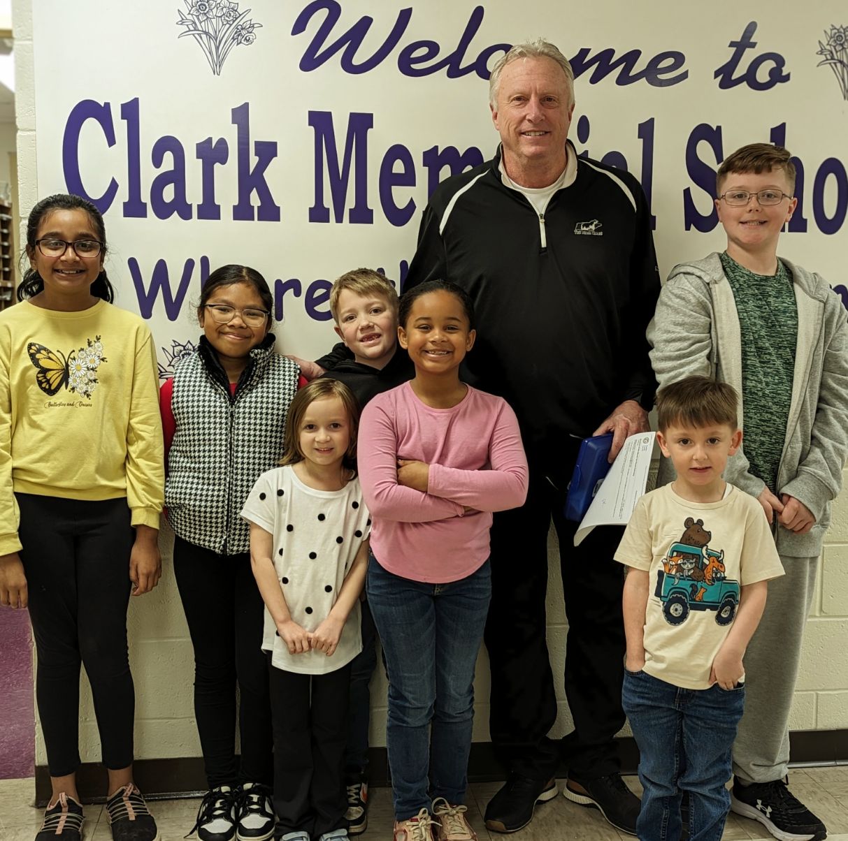 February Warriors of the month. Pictured left to right: Ruhi Patel, Addison Champion, Myles Stevens, Principal David Carson, Lucas Wilson, Ikora Litchford, Aria Robinson, and Bryson Toll