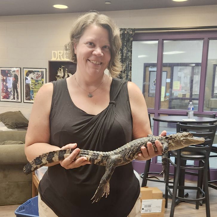 Mrs. Brobst holding an alligator