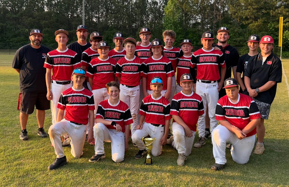 2026 Baseball team posing with trophy after receiving runner up in the championship game