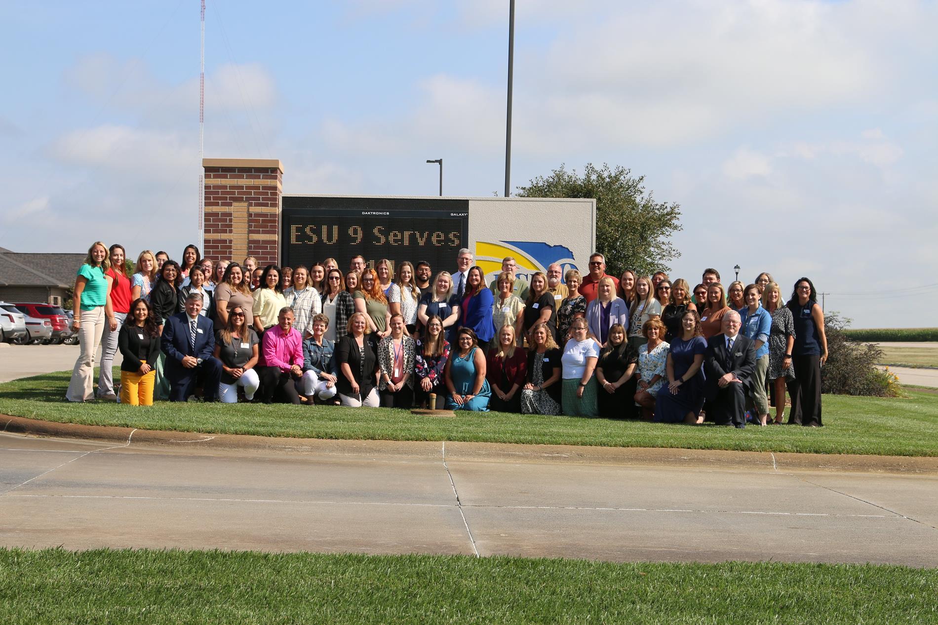 All ESU 9 Staff in front of ESU 9 sign