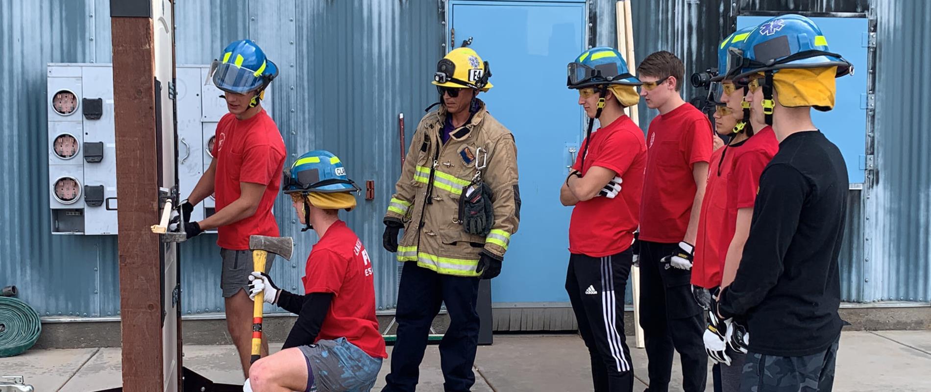 CTE firefighter class students learn to use breaker bar