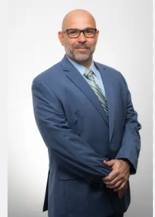 Dr. Cirillo - photo of man in suit