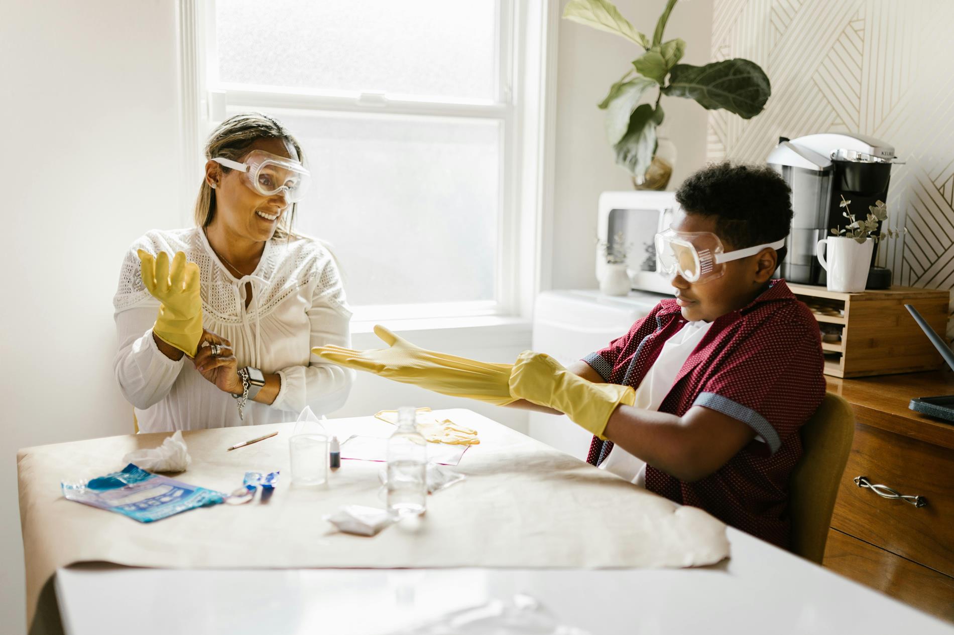 Adult and child conducting a science experiment