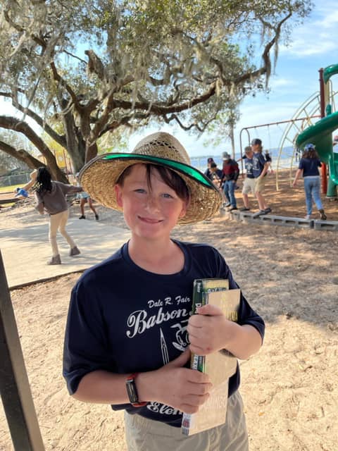 Gnats wearing hats to celebrate Hats Off To Reading on our first day of Literacy Week.