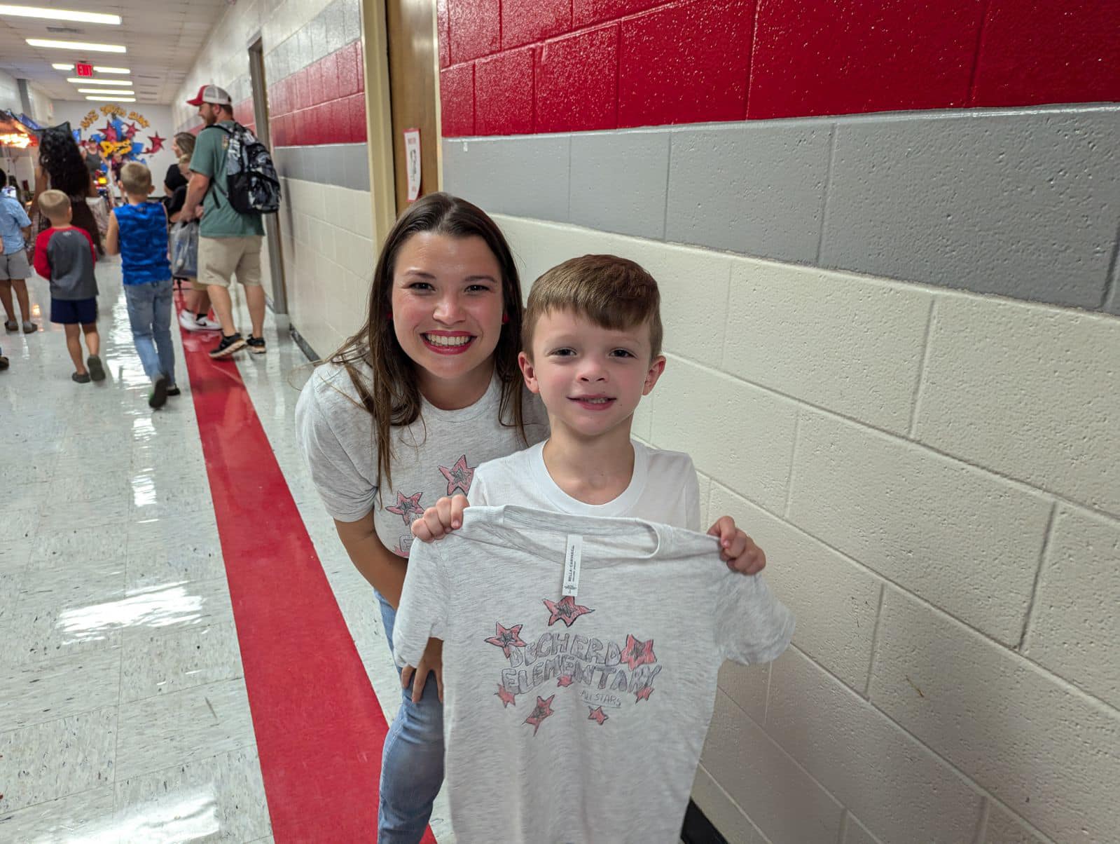 T-Shirt Design Winner and Mrs. Geer