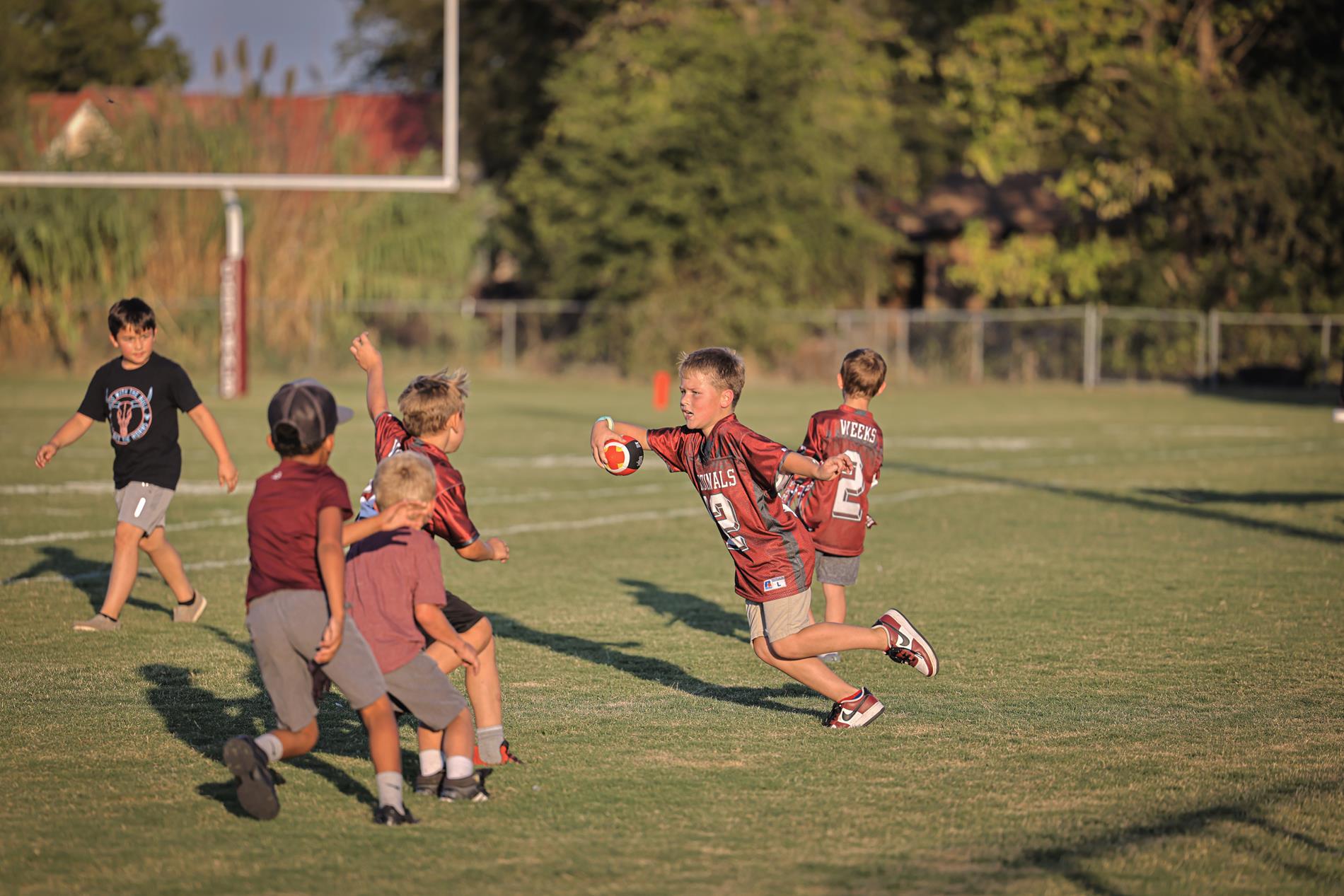 Kids playing football