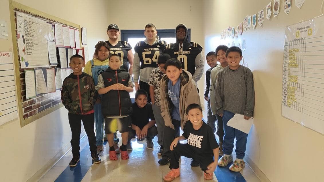 Oct 2023 ECCC Football players and coach visit