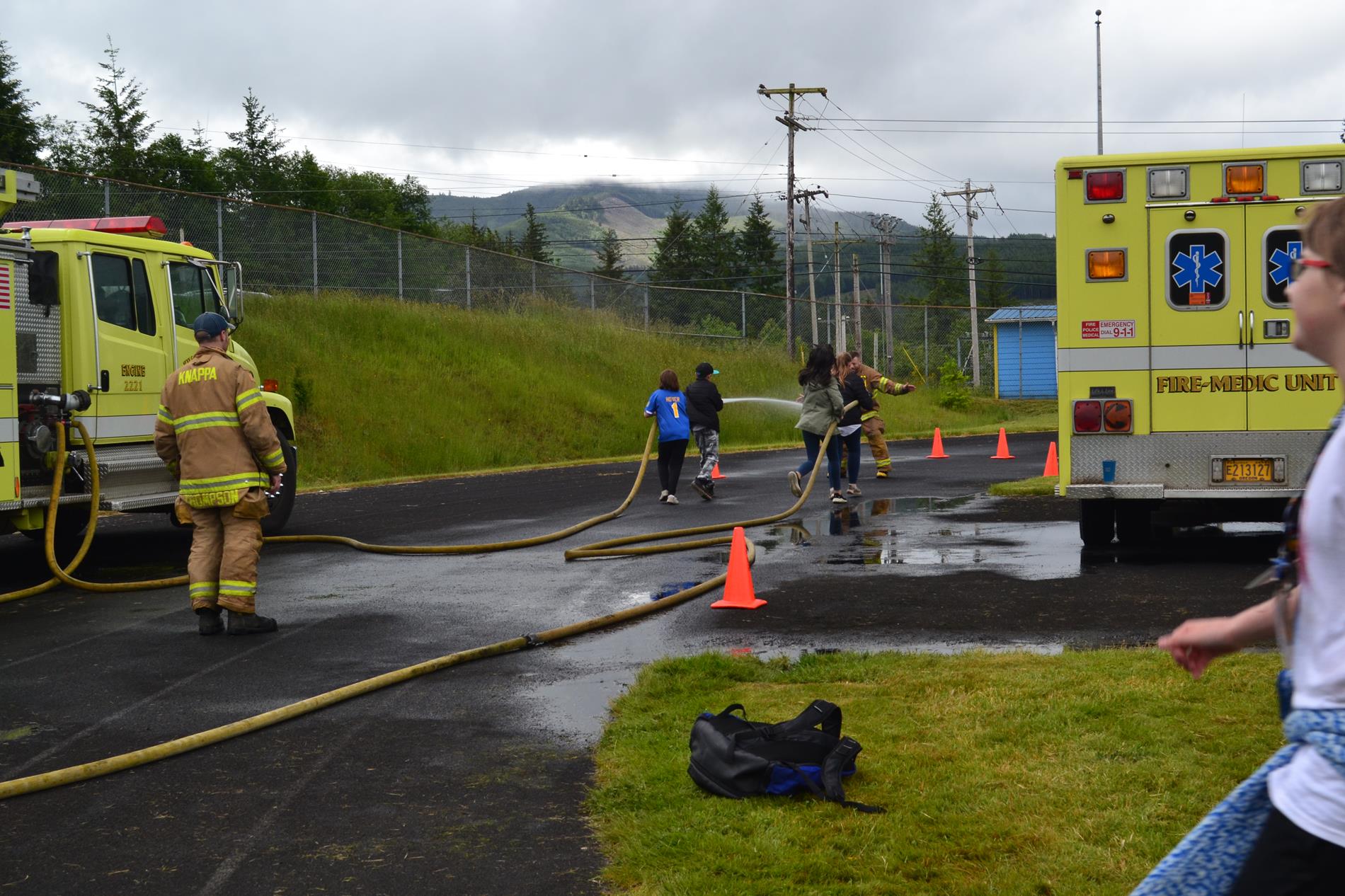 5th graders participating in the fire hose relay