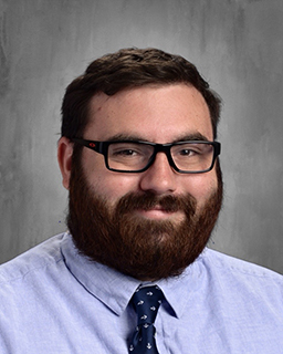 headshot of Jonathan Moss, Director of Special Services