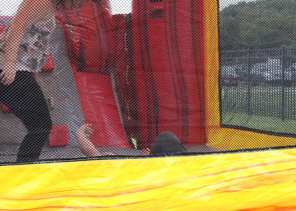 bouncing in the bounce house